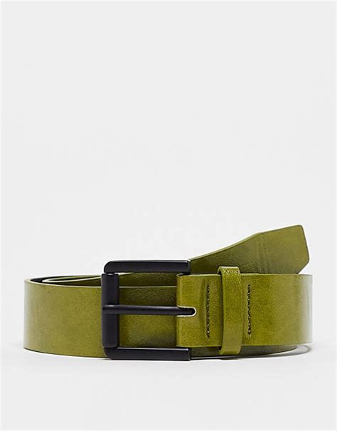 ASOS DESIGN wide faux leather belt in black with .